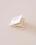 A booklet of incense papers labeled 'Candied Violets' by Ponsont, featuring a purple and white color scheme.