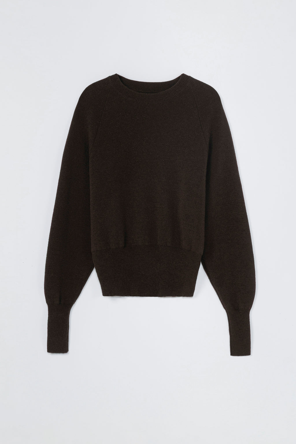 Black cashmere sweater on a light gray background