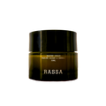 A jar of Rassa Botanicals Heaven Cream with marine algae & neroli. The jar is dark colored with a simple, elegant design.