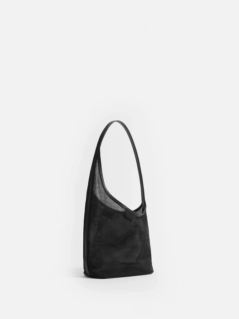 Black shoulder bag on a white background