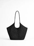 Black textured tote bag on a white background