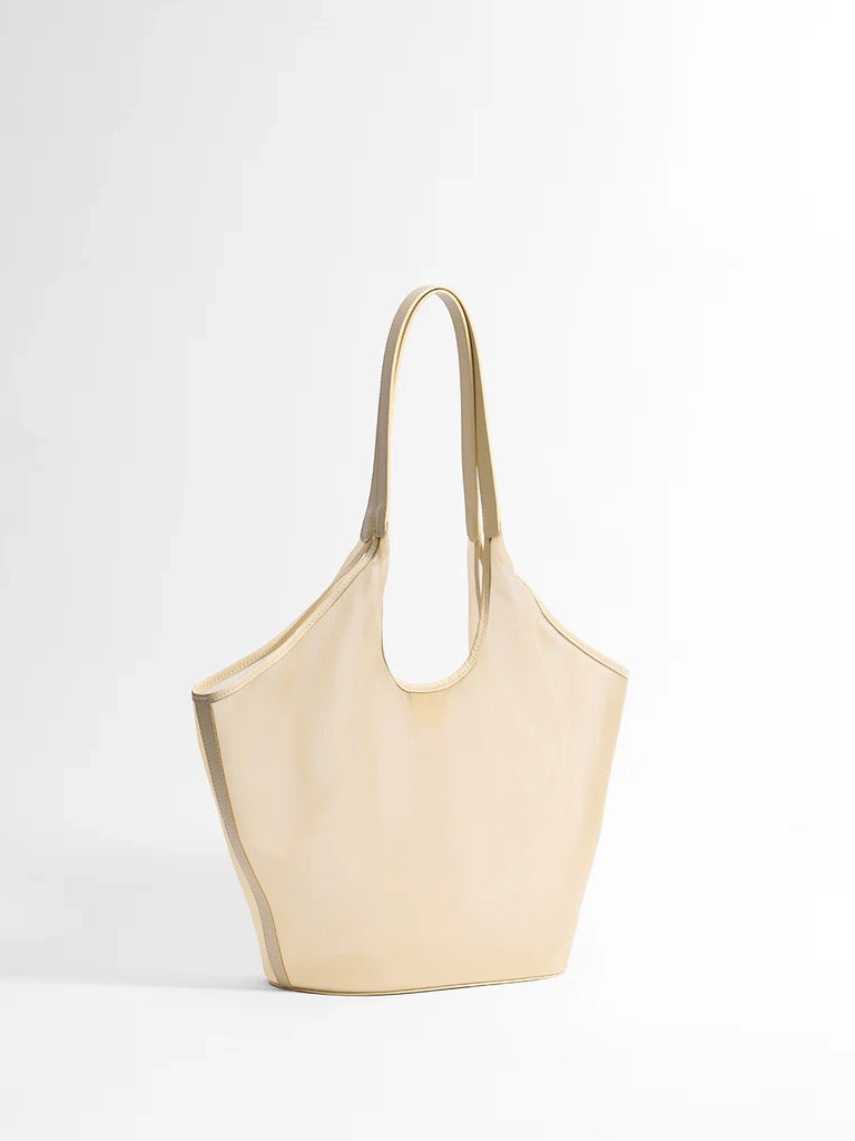 Beige tote bag on a white background