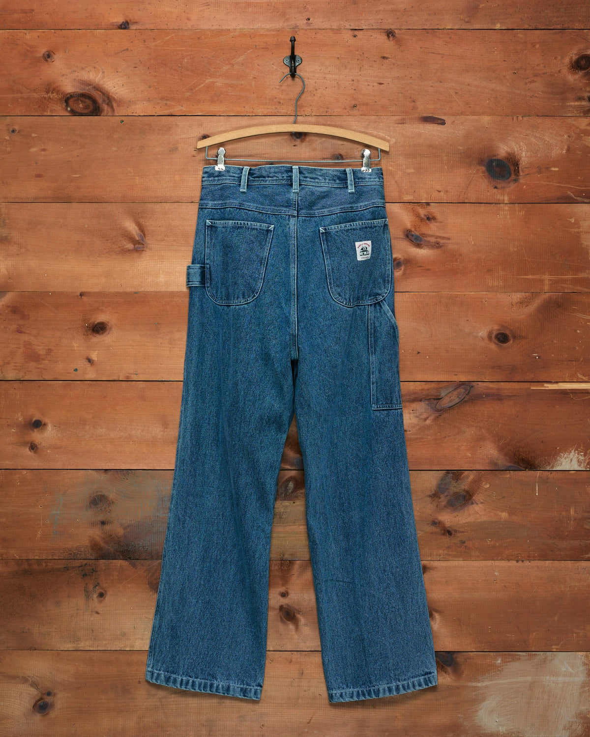 Bode Washed Denim Knolly Brook Trousers in blue with a straight-leg workwear silhouette, side utility pocket and hammer loop.
