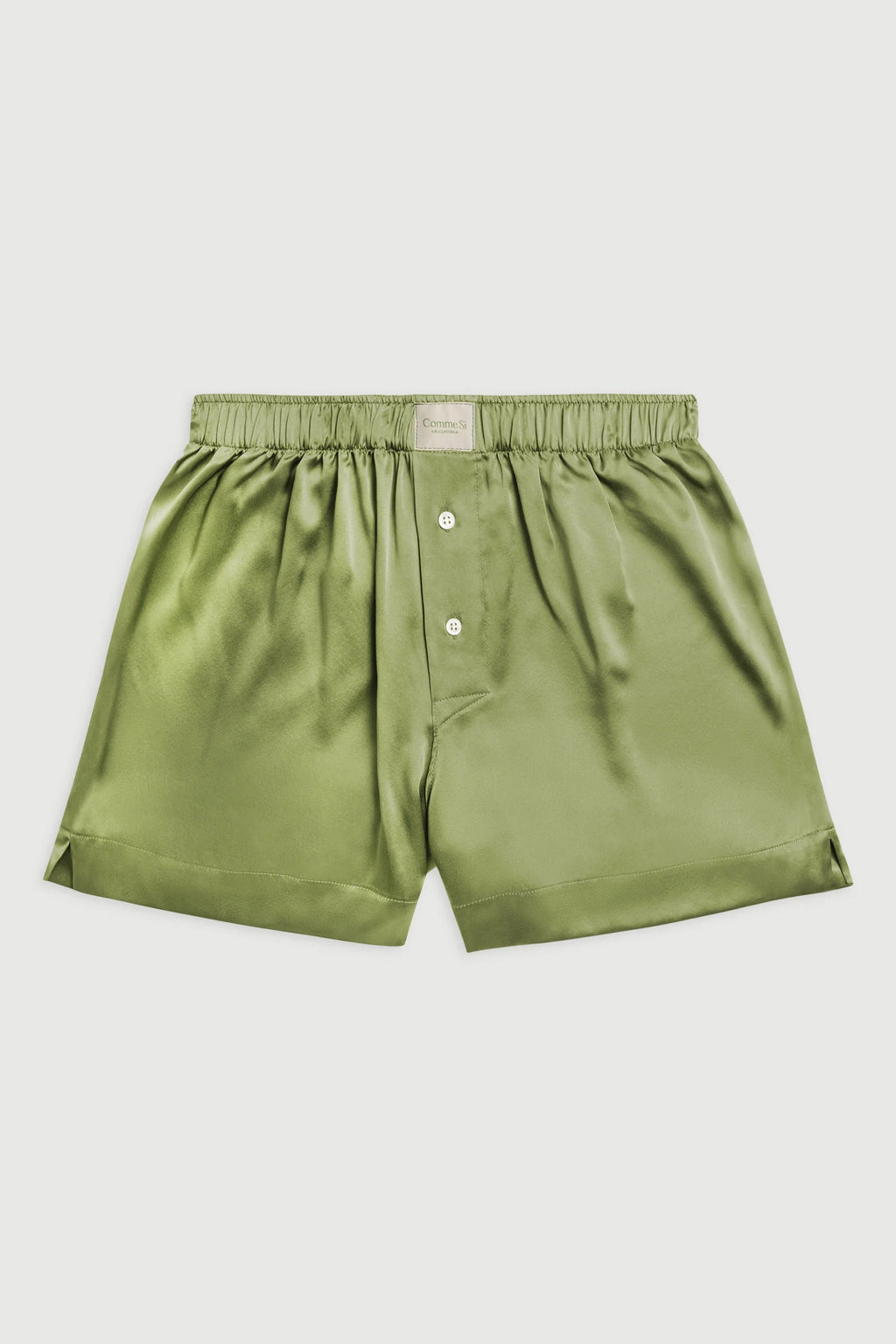 Green shorts on a light gray background