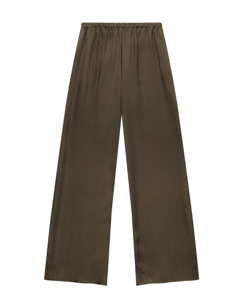 Comme Si Everyday Pant in umber cupro twill with a wide-leg silhouette, fluid drape, and covered elastic waistband.