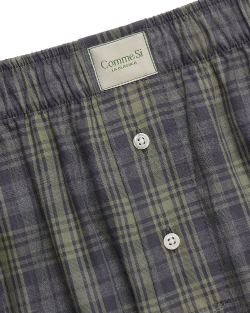 Comme Si La Boxer Alta in grey sage plaid cotton flannel with a wide-leg silhouette, covered elastic waistband, and side slits at the hem.