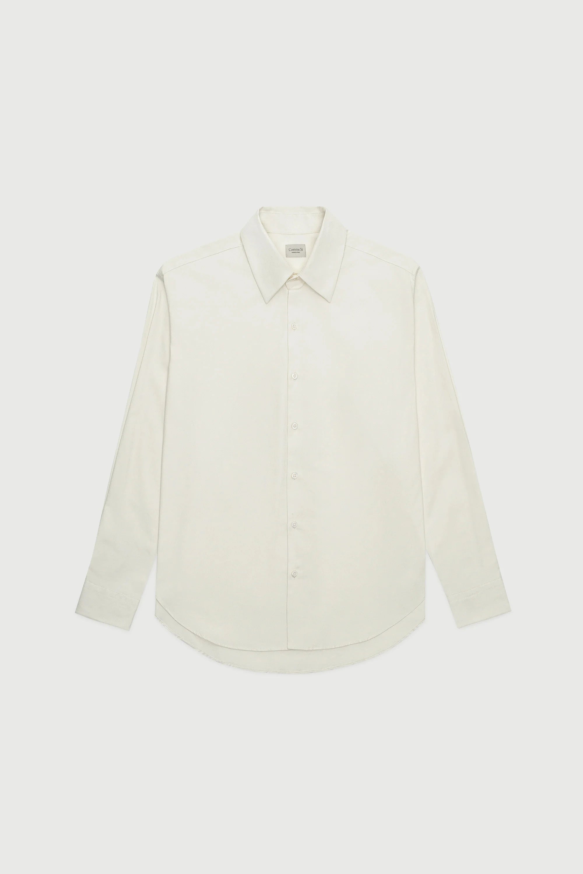 White shirt on a light beige background