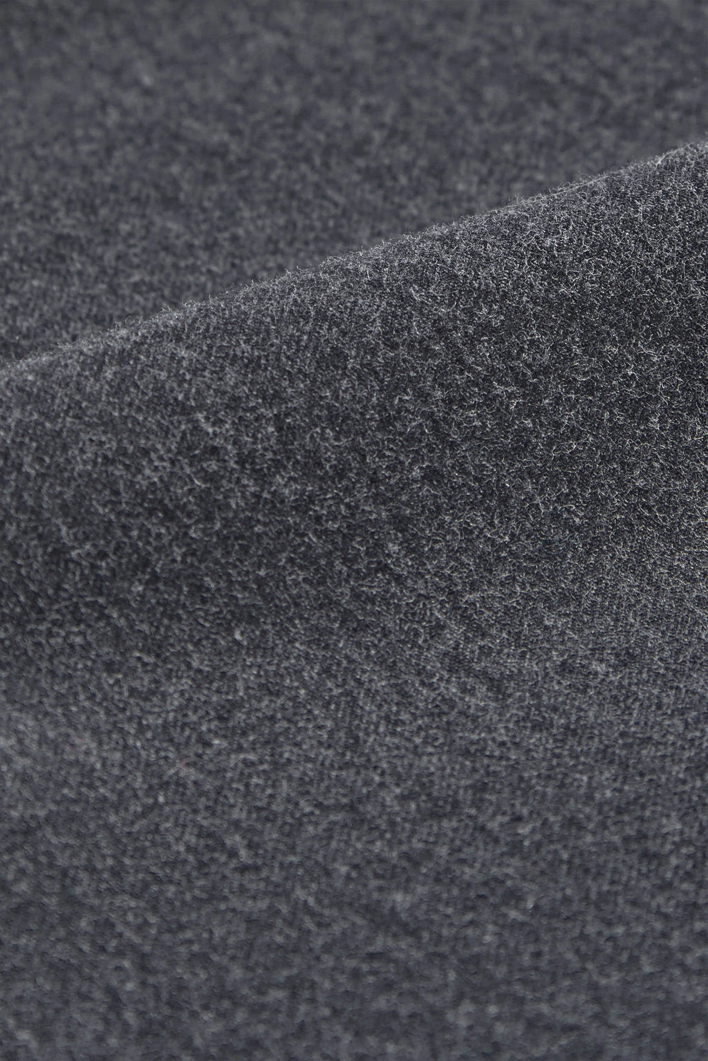 Close-up of textured dark gray fabric
