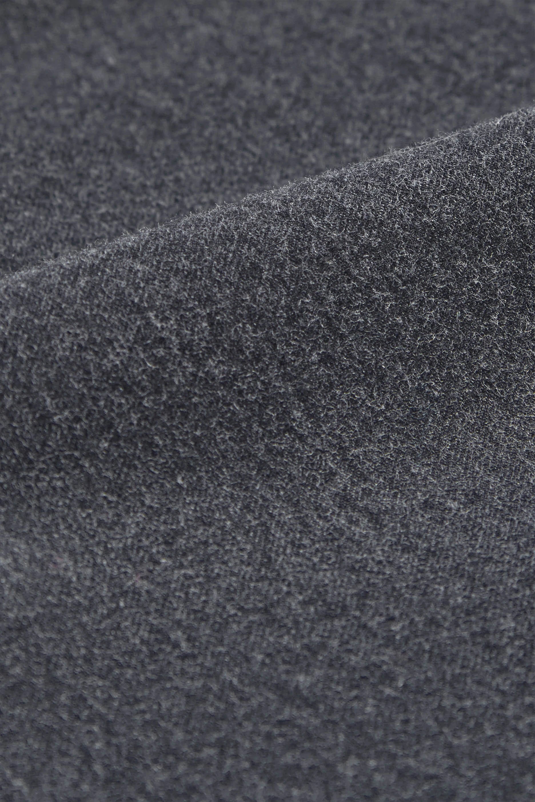 Close-up of textured dark gray fabric