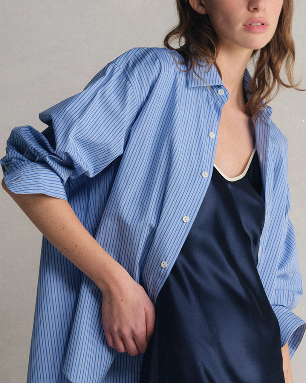 Model wearing Comme Si La Shirt Classica in Celeste Stripe