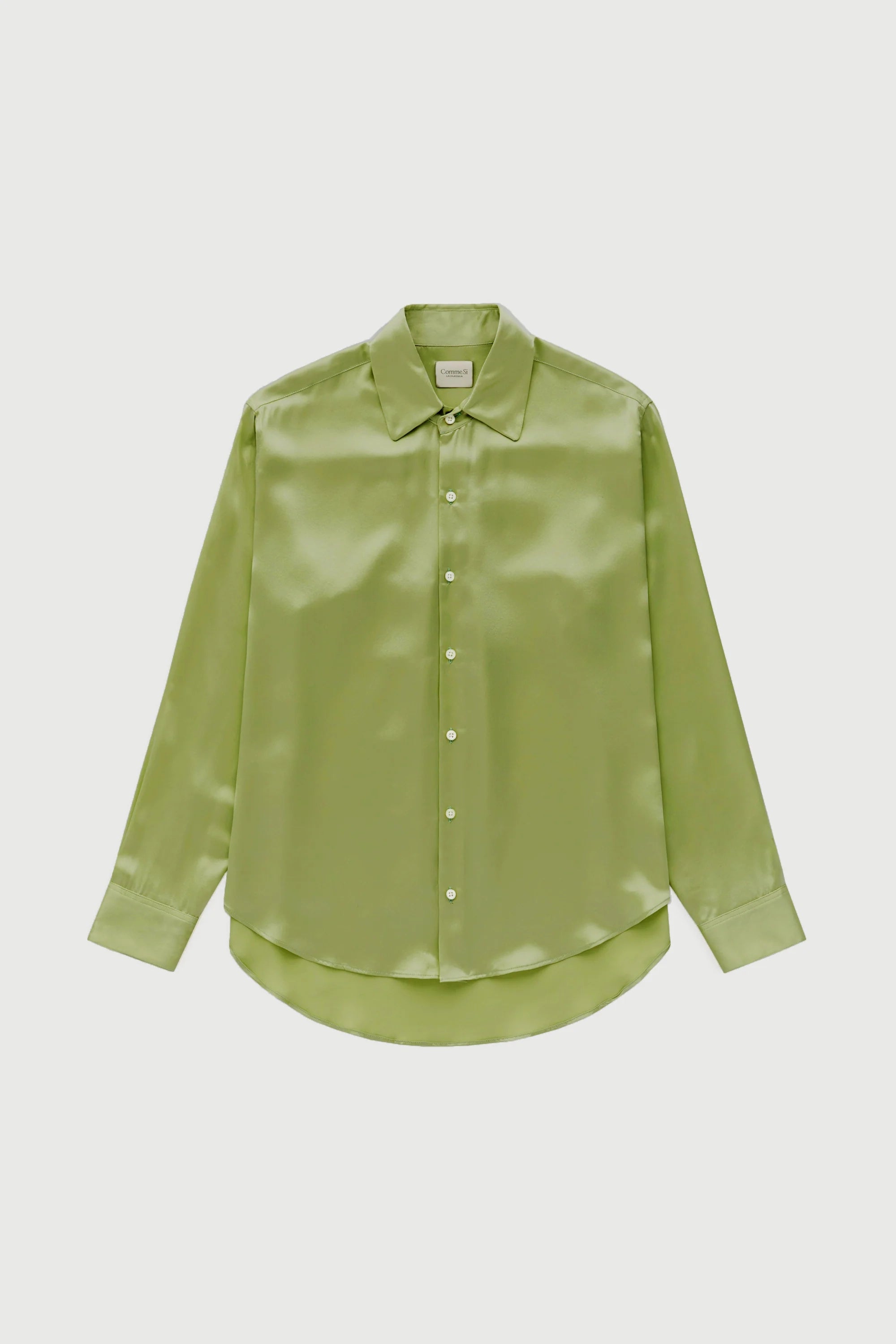Green satin shirt on a light gray background