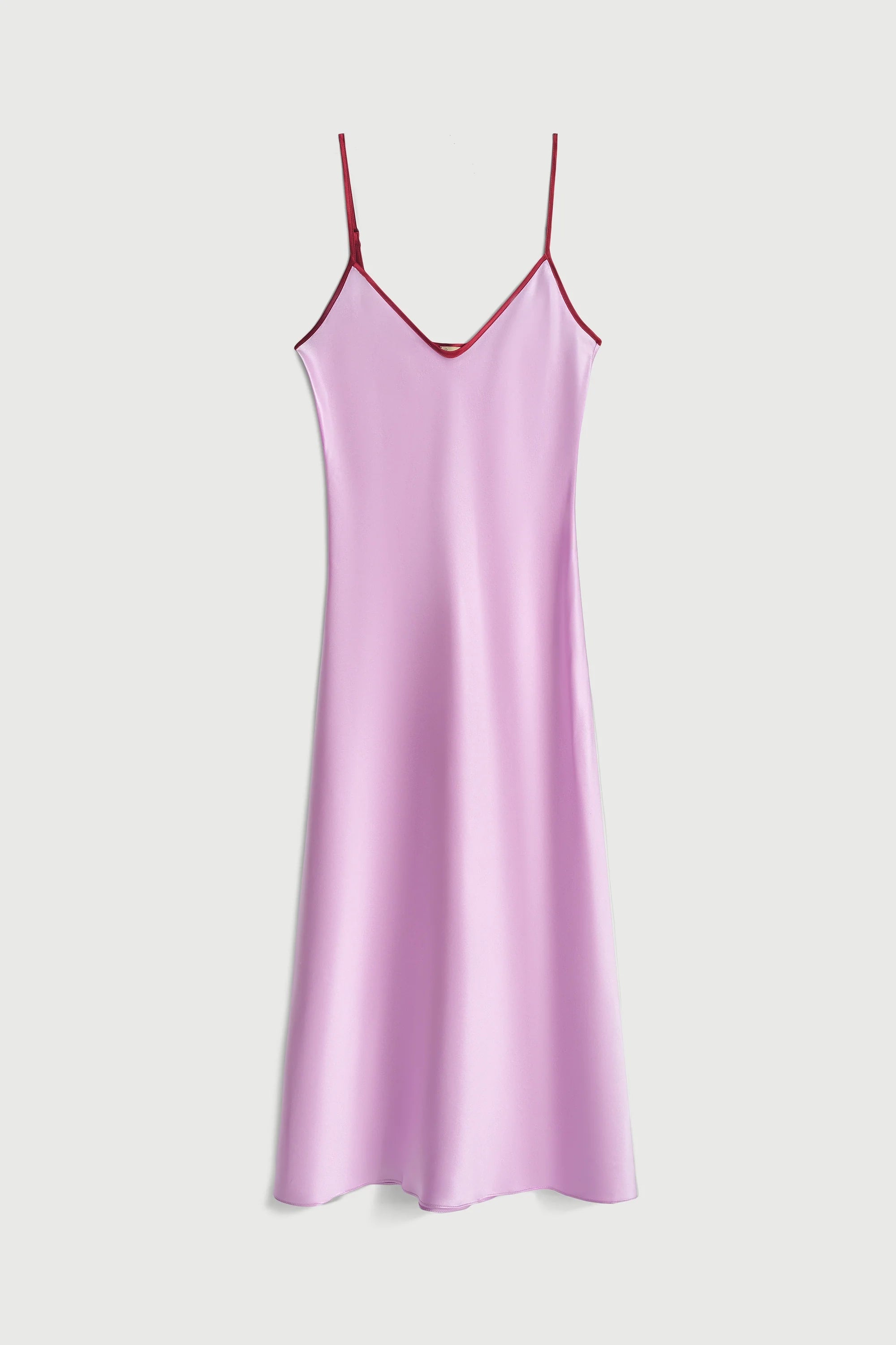 Lavender slip dress with thin straps on a white background
