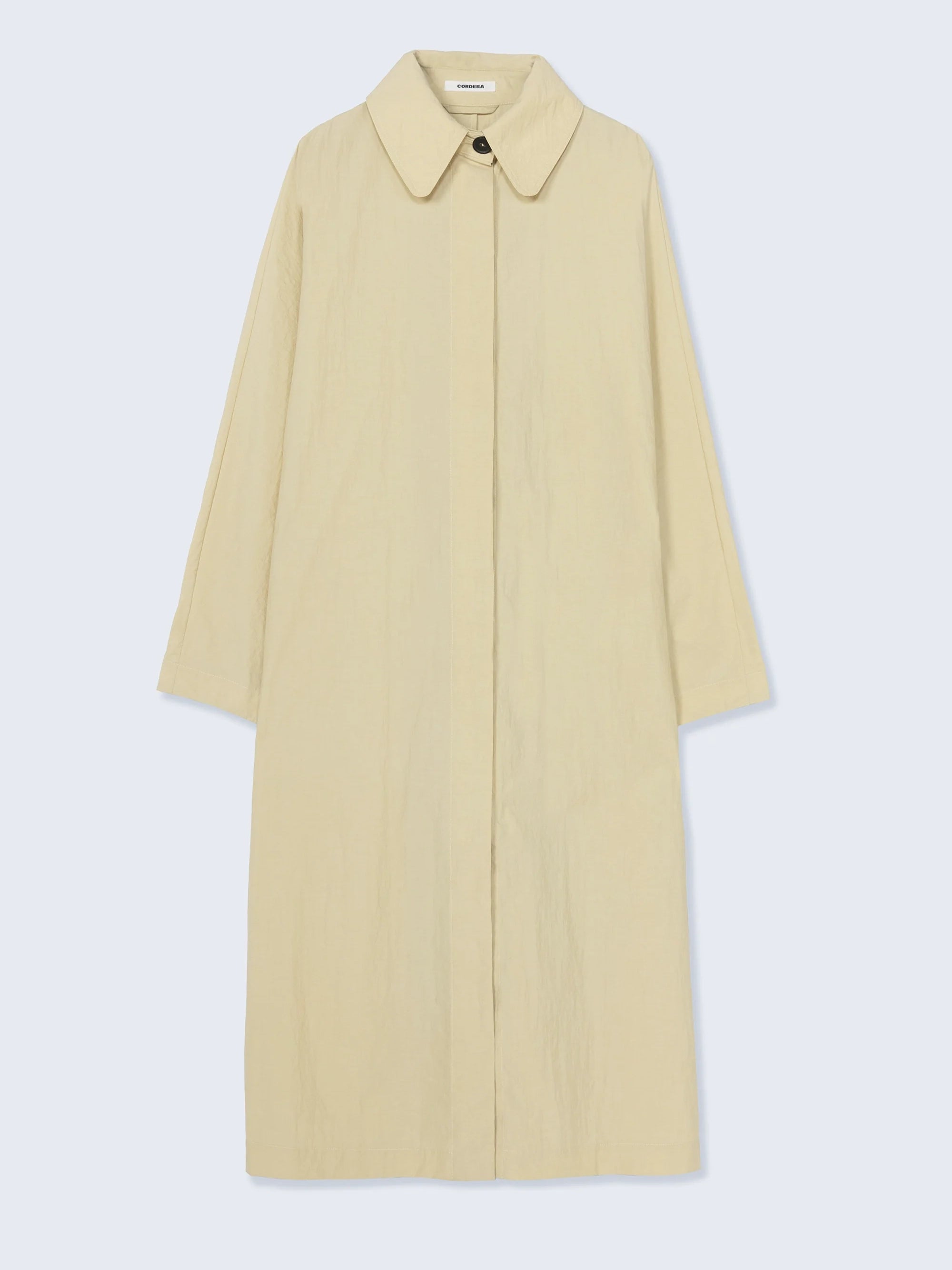 Beige coat on a light gray background