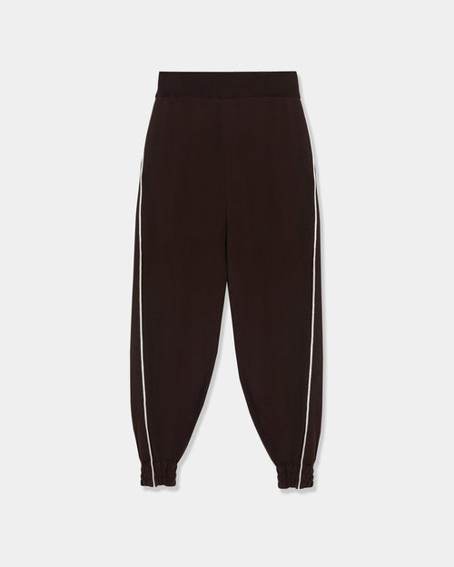 CORDERA Organic Cotton Sporty Pants in brown with a contrasting white side stripe and gathered hems.