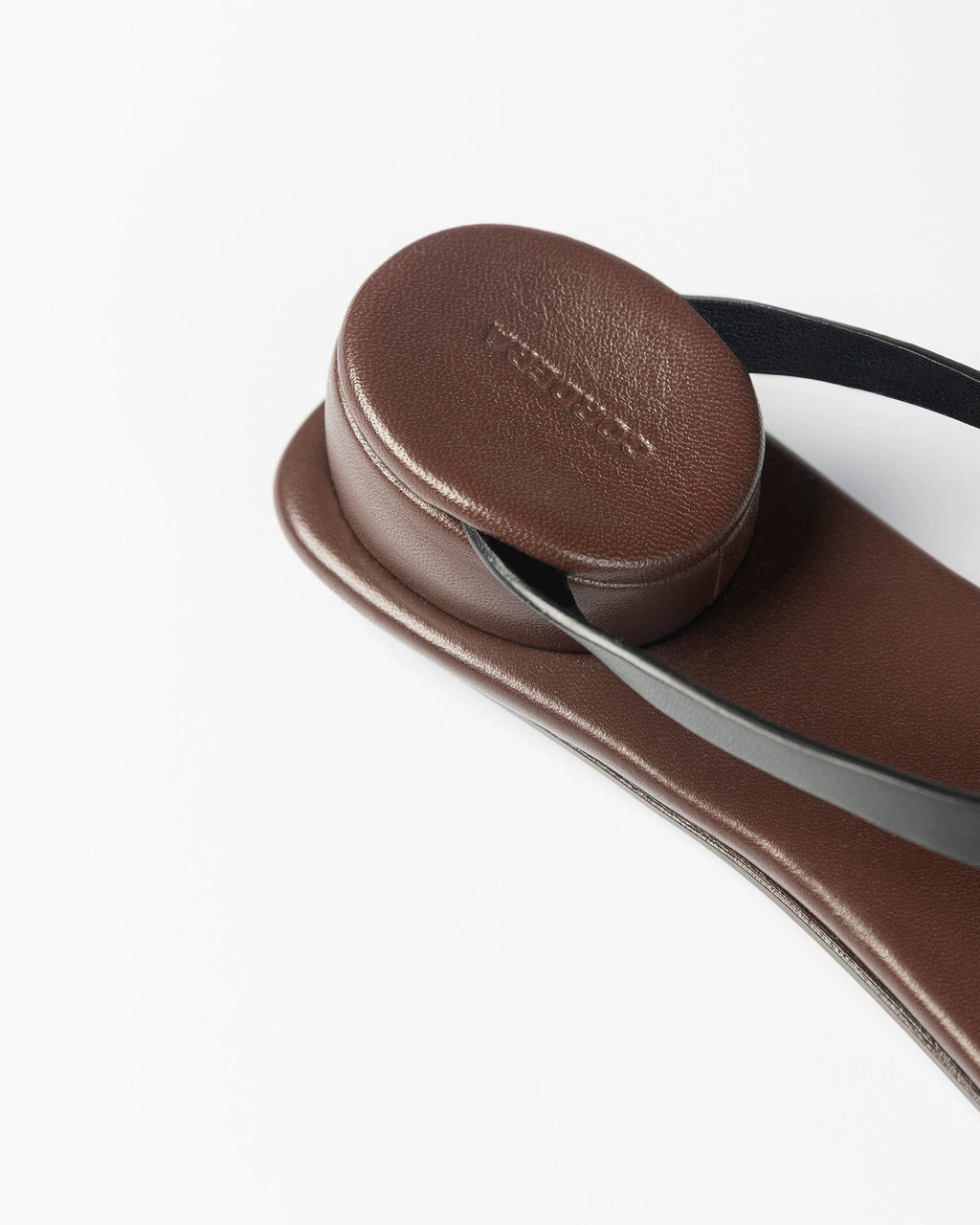 CORDERA Estructura Sandal in black calfskin with slim black straps, brown-burgundy sole and raised oval heel.