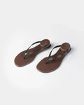 CORDERA Estructura Sandal in black calfskin with slim black straps, brown-burgundy sole and raised oval heel.