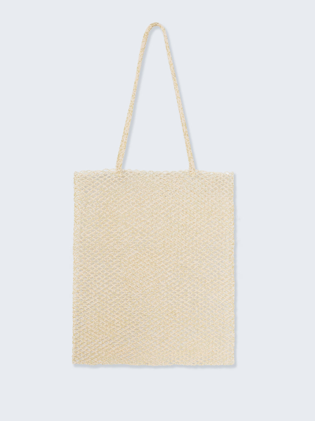 Beige woven tote bag on a light gray background