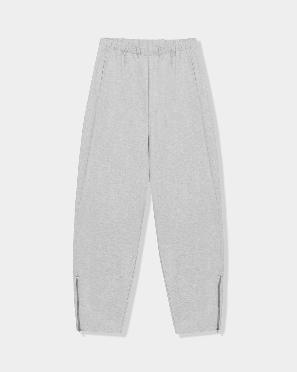 CORDERA Lounge Pants in grey with a relaxed, straight silhouette and zippered hems.