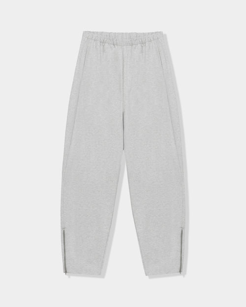 CORDERA Lounge Pants in grey with a relaxed, straight silhouette and zippered hems.