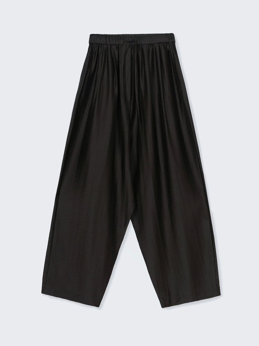 Black wide-leg pants on a light gray background