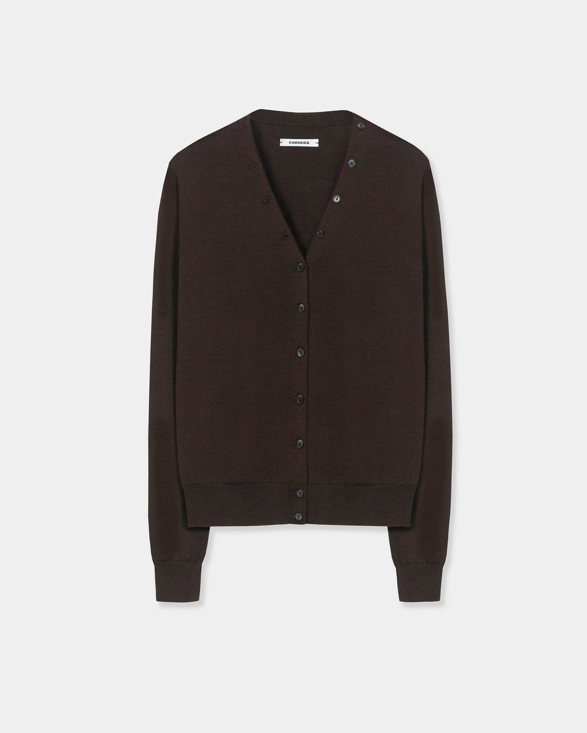 CORDERA Merino Wool Button Cardigan in brown with a V-neckline and decorative buttons extending along the neckline.