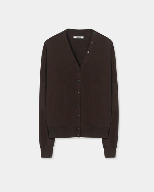 CORDERA Merino Wool Button Cardigan in brown with a V-neckline and decorative buttons extending along the neckline.