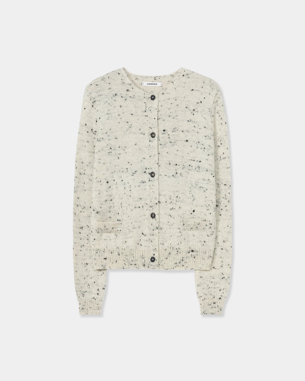 CORDERA Merino Wool Flecked Cardigan in natural with a flecked chunky knit, button front and patch pockets.