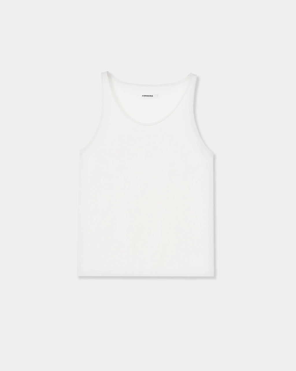 CORDERA Merino Wool Tank Top in white with a fitted silhouette and oval neckline.