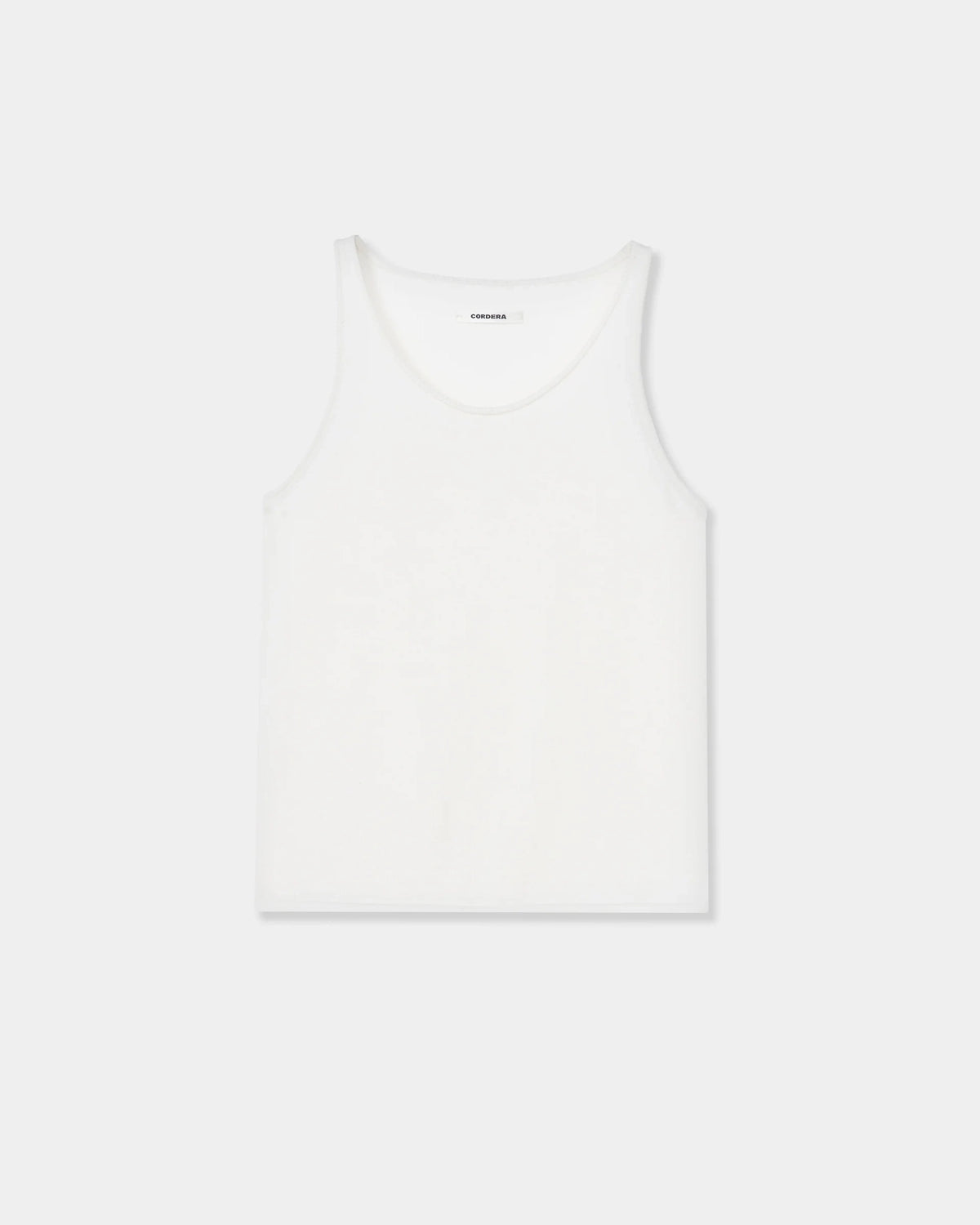 CORDERA Merino Wool Tank Top in white with a fitted silhouette and oval neckline.