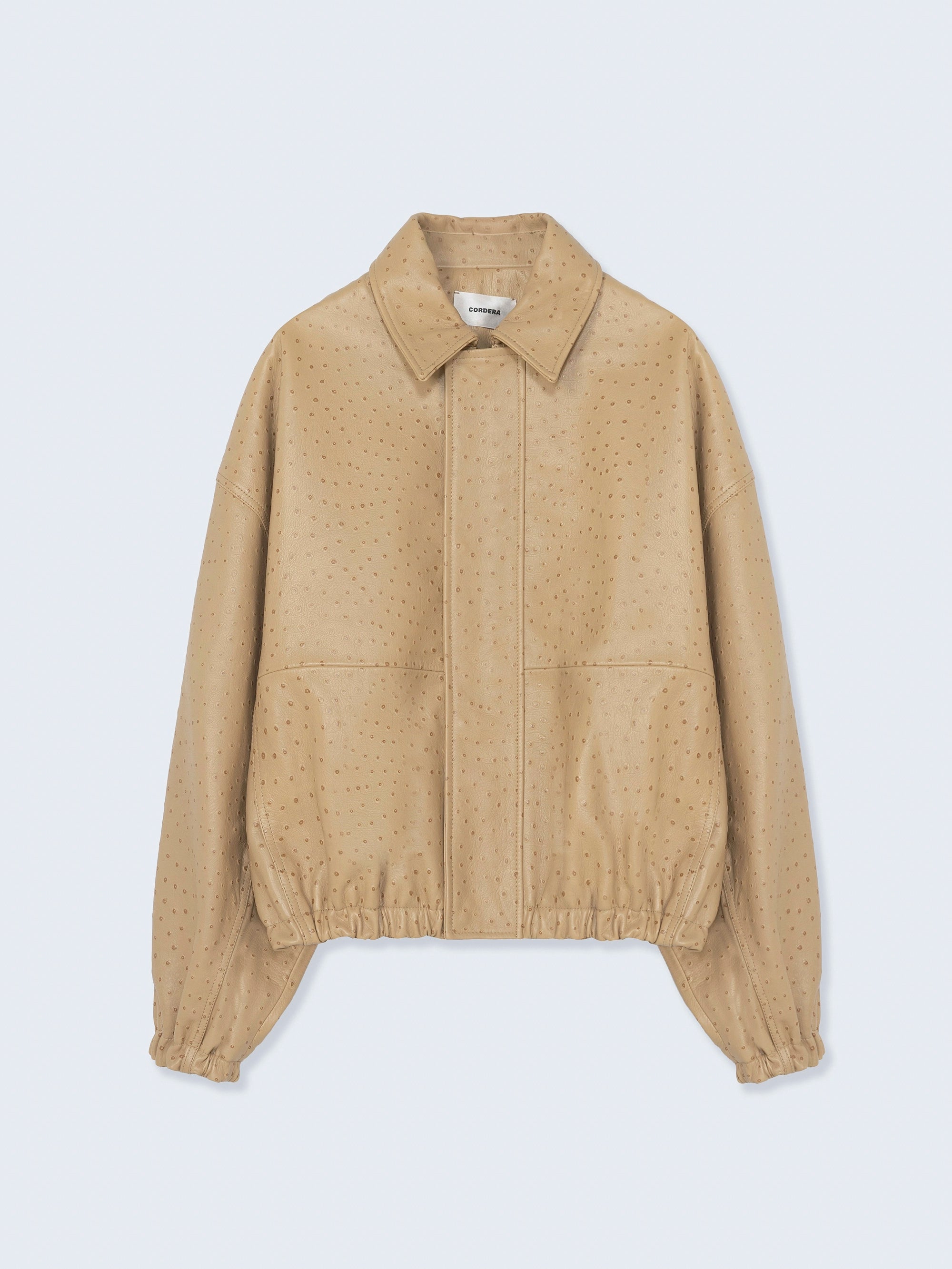 Beige jacket on a light gray background