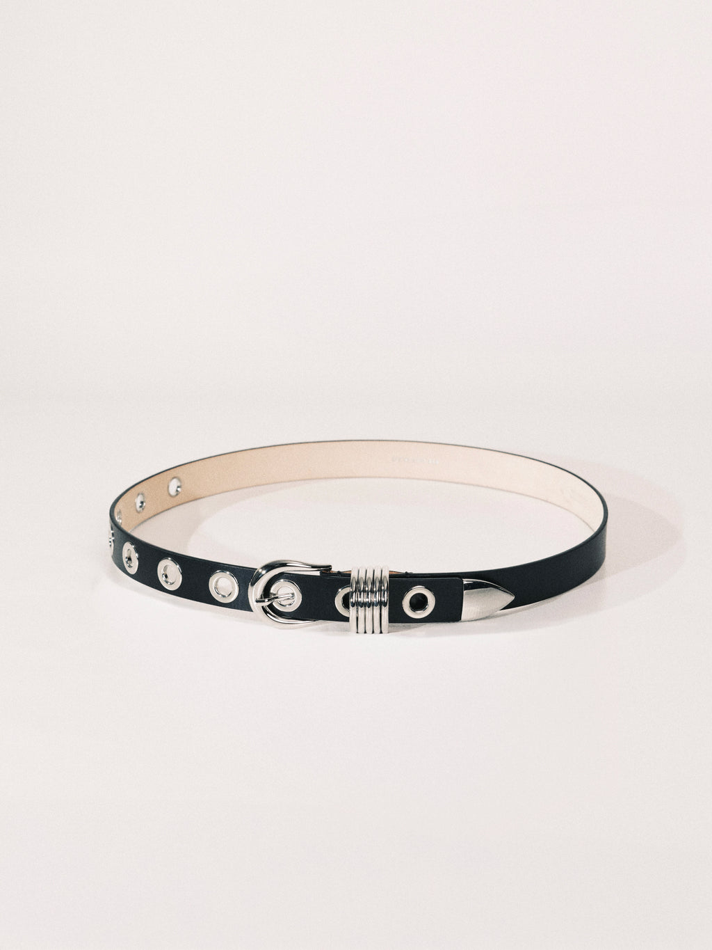 Black leather belt with silver hardware on a white background