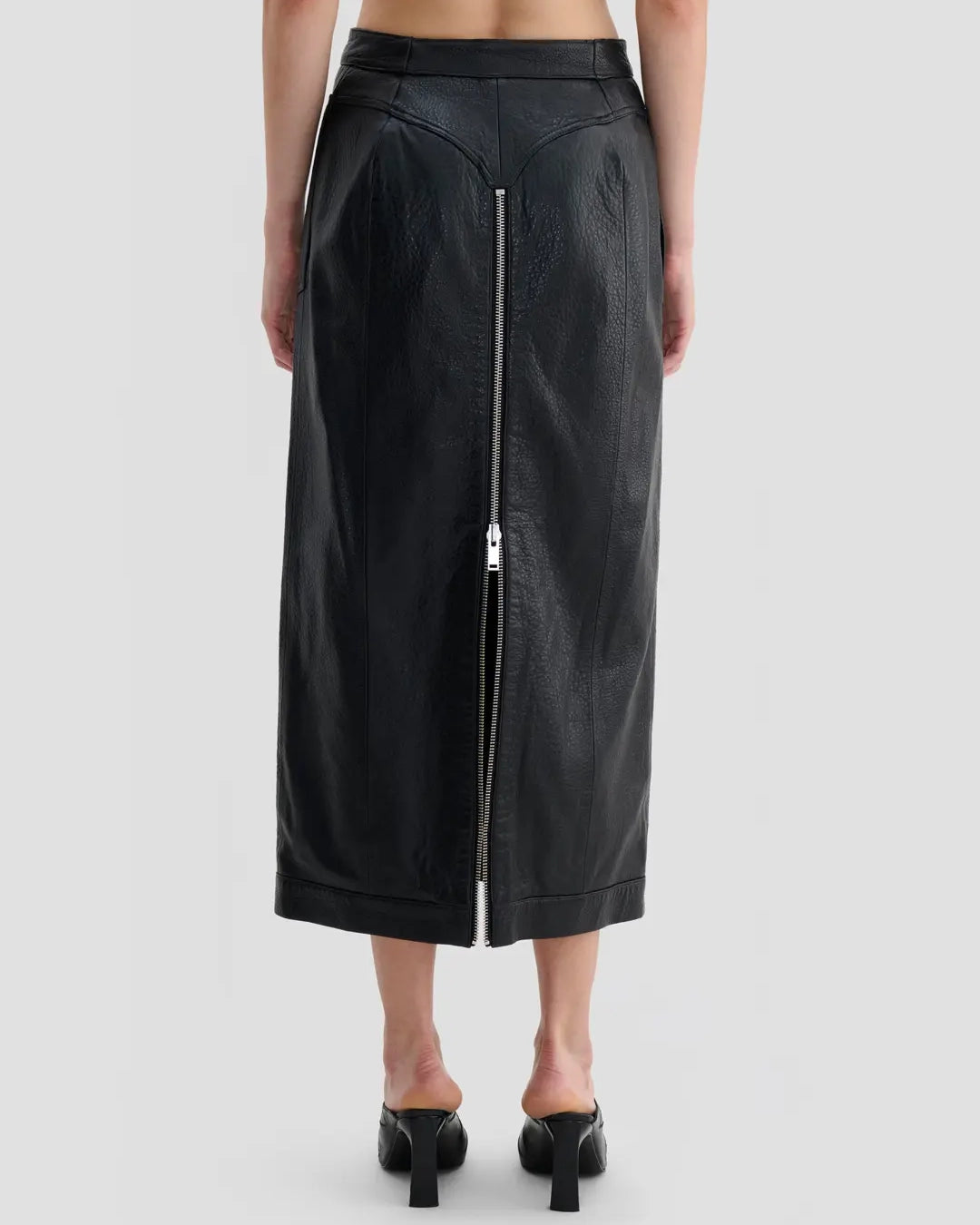 Back view of Eckhaus Latta Cruising Skirt in dusk with a high-rise, straight silhouette and center-front zip closure.