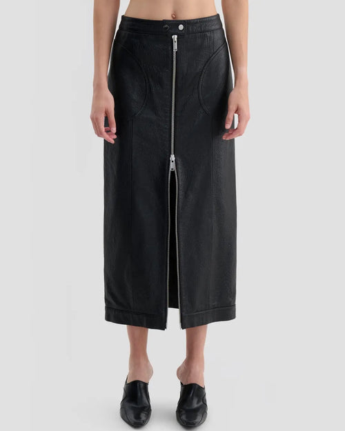 Detail view of Eckhaus Latta Cruising Skirt in dusk with a high-rise, straight silhouette and center-front zip closure.