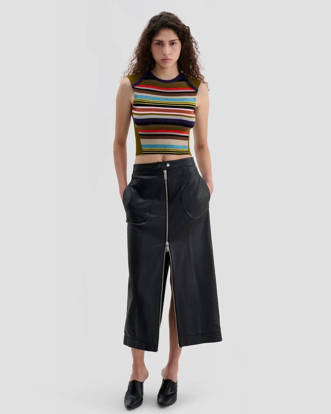 Model wearing Eckhaus Latta Envelope Top in Spectrum with a fitted shape and multicolor striped front.