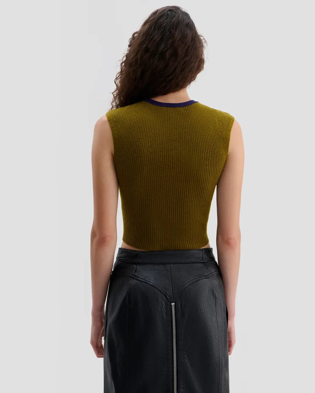 Back view of model wearing Eckhaus Latta Envelope Top in Spectrum with a fitted shape and multicolor striped front.