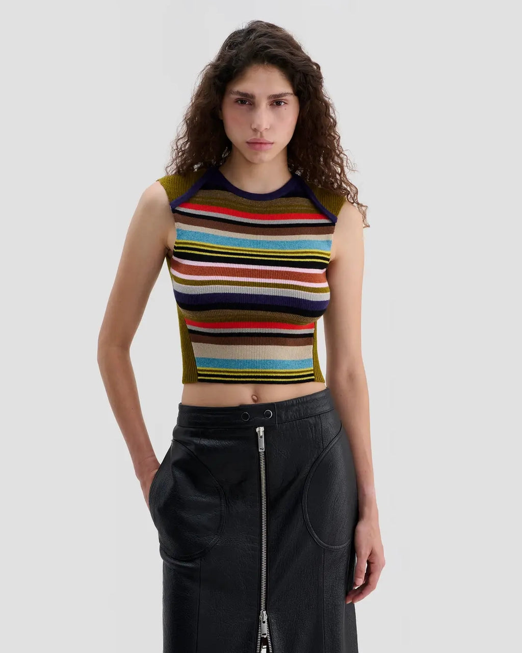Model wearing Eckhaus Latta Envelope Top in Spectrum with a fitted shape and multicolor striped front.