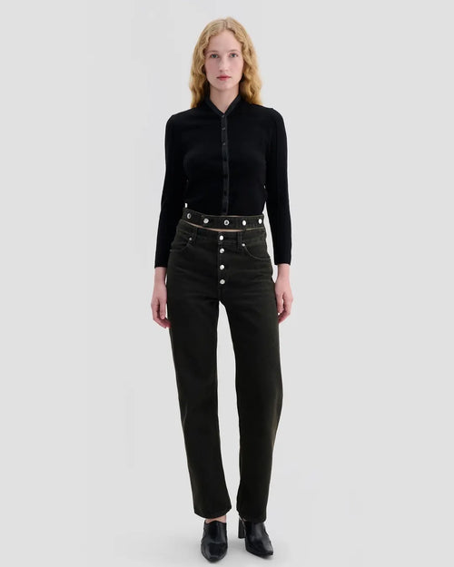 Model wearing Eckhaus Latta Racer Cardigan in black with charcoal trim and a shrunken fit.