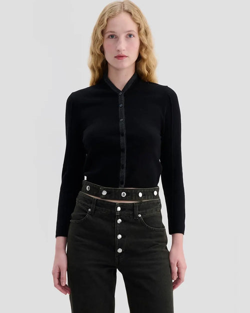 Model wearing Eckhaus Latta Racer Cardigan in black with charcoal trim and a shrunken fit.