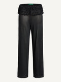 Black pants with lace trim on a white background