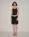 Ash Ruffle Shorts in Black by EMILY DAWN LONG