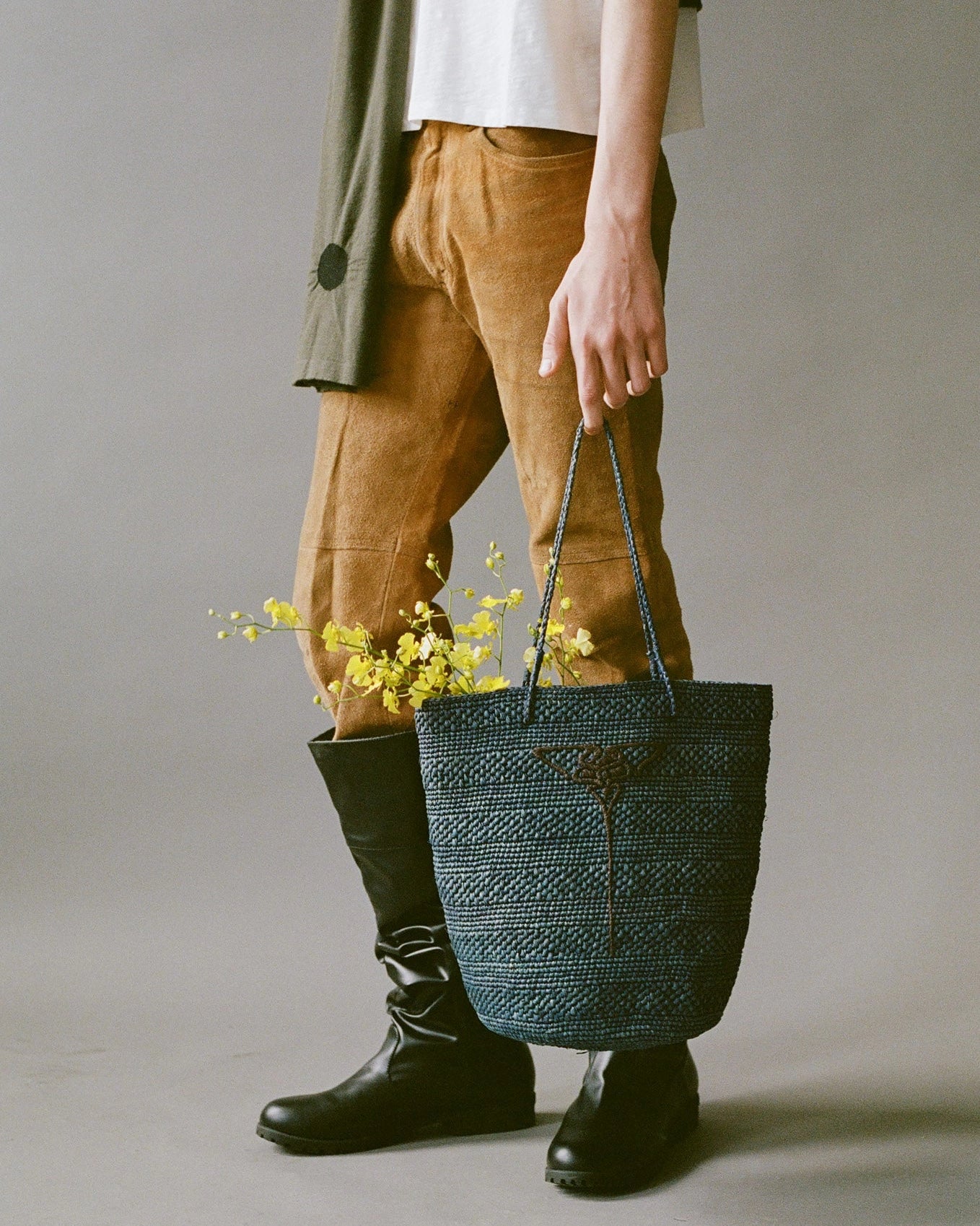 Blue hand-crocheted raffia tote by EMILY DAWN LONG with hand-embroidered Art Nouveau fan motif.