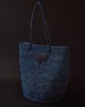 Blue hand-crocheted raffia tote by EMILY DAWN LONG with hand-embroidered Art Nouveau fan motif.