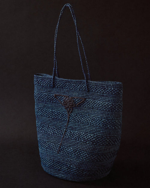 Blue hand-crocheted raffia tote by EMILY DAWN LONG with hand-embroidered Art Nouveau fan motif.