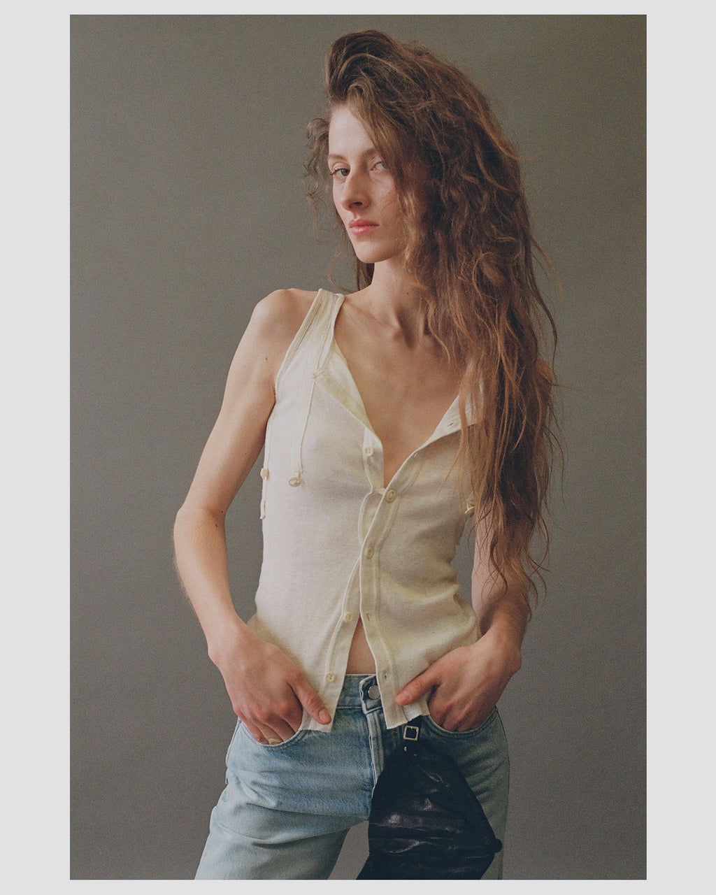 Model wearing Willow 1890 Ribbed Tank in Ivory by EMILY DAWN LONG