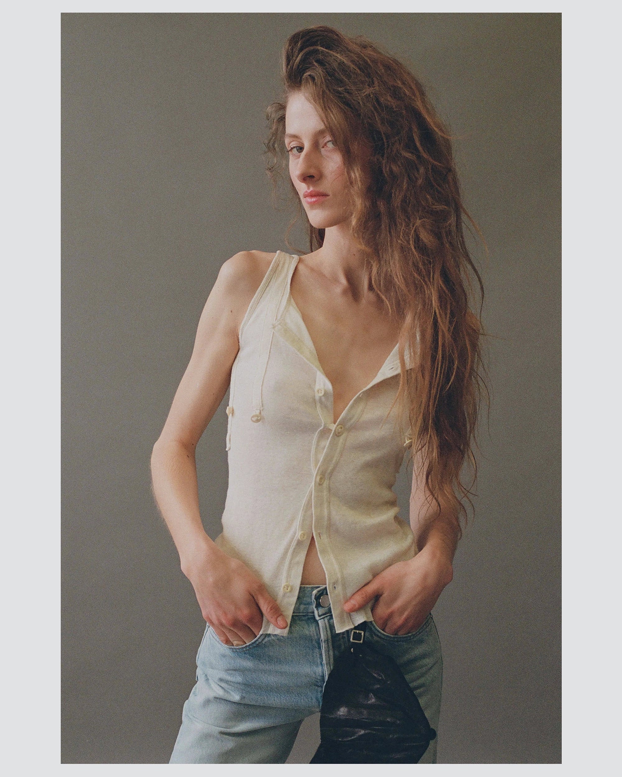 Model wearing Willow 1890 Ribbed Tank in Ivory by EMILY DAWN LONG