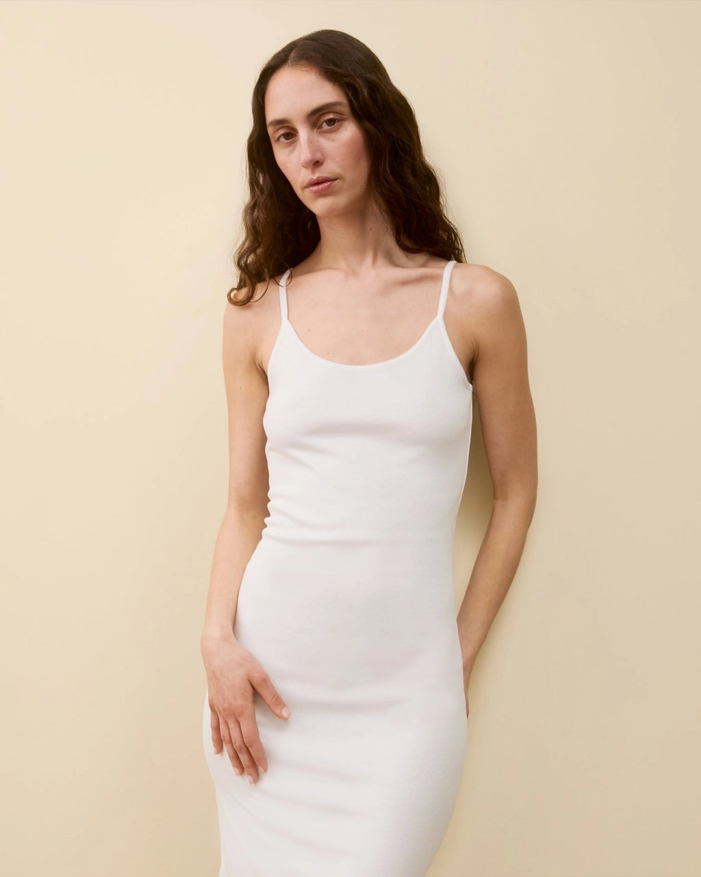 ￼Model wearing Bibi Dress LW in White by FLORE FLORE front view