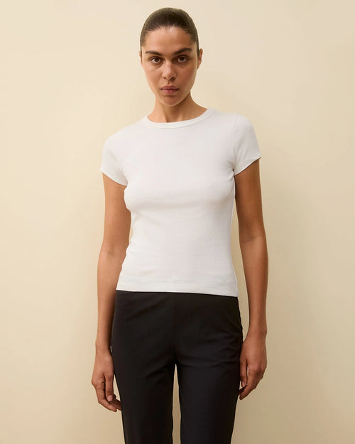 Model wearing Car Baby Tee in White by FLORE FLORE
