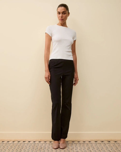 Model wearing Car Baby Tee in White by FLORE FLORE