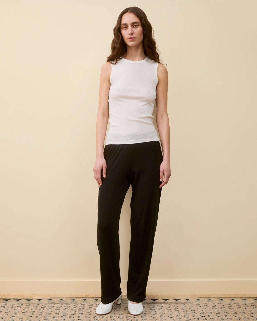 Model wearing Esmé Tank LW in White by FLORE FLORE front view