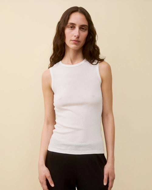 Model wearing Esmé Tank LW in White by FLORE FLORE front view